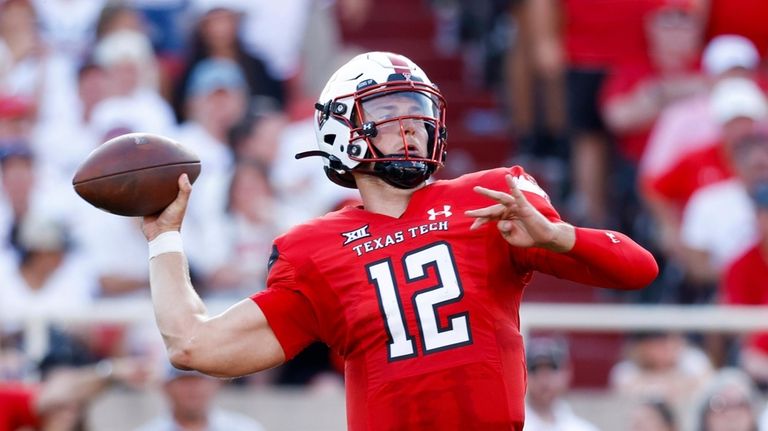 Then-Texas Tech quarterback Tyler Shough throws a pass against Oregon...