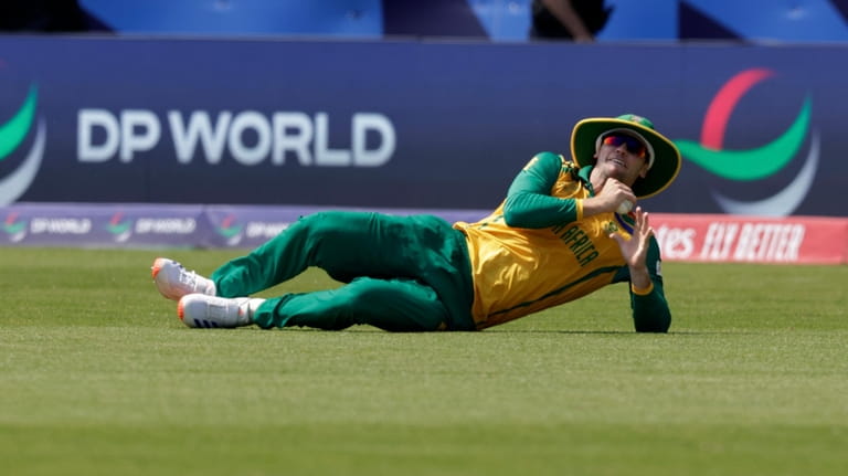South Africa's Tristan Stubbs takes the catch to dismiss Sri...