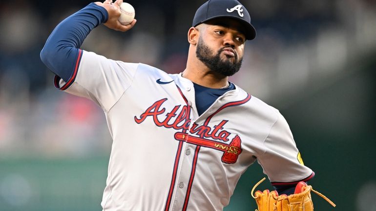 Atlanta Braves starting pitcher Reynaldo Lopez throws during the first...