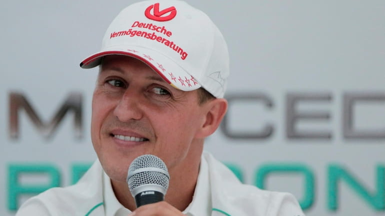 Michael Schumacher announces his retirement from Formula One during a...