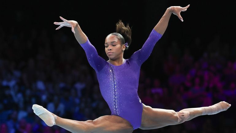 United States' Shilese Jones competes on the floor during the...