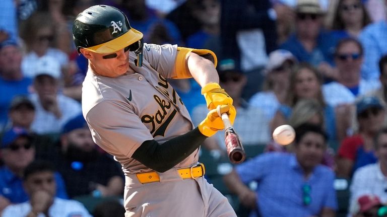 Oakland Athletics' Zack Gelof hits a one-run double during the...