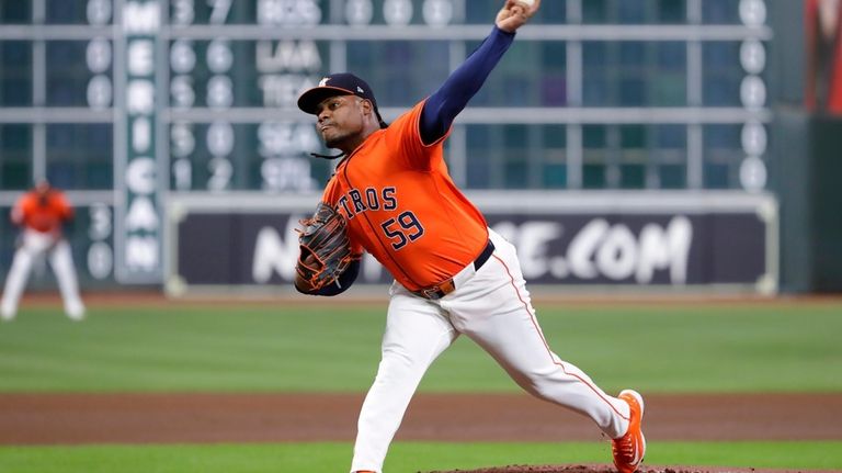 Houston Astros starting pitcher Framber Valdez throws against the Arizona...