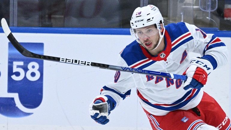 Rangers left wing Artemi Panarin skates against the Islanders in...