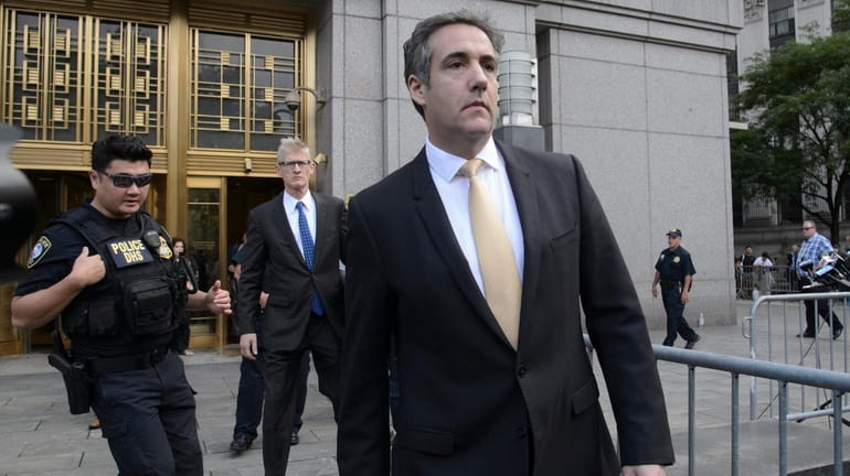 Michael Cohen leaves a federal courthouse in Manhattan on Aug....