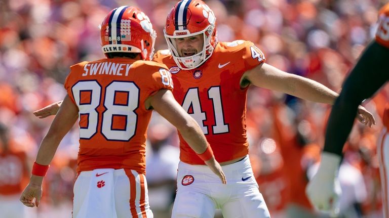 Clemson place kicker Jonathan Weitz (41) celebrates with wide receiver...