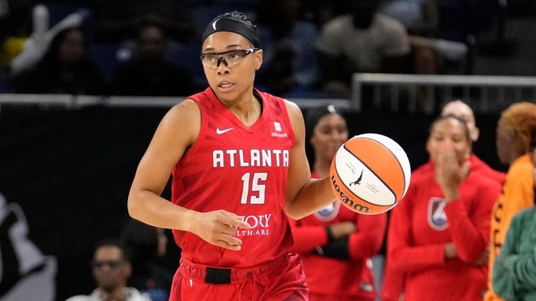 Atlanta Dream's Allisha Gray advances the ball during a WNBA...