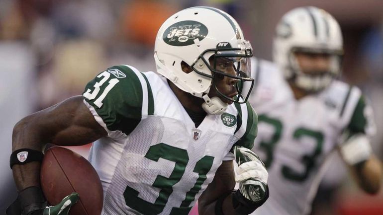 New York Jets cornerback Antonio Cromartie (31) heads up field...