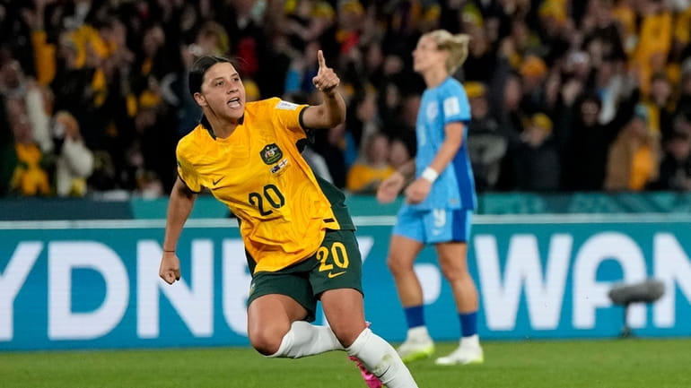 Australia's Sam Kerr celebrates after scoring her side's first goal...