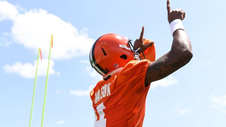 Deshaun Watson of the Cleveland Browns walks onto the field...