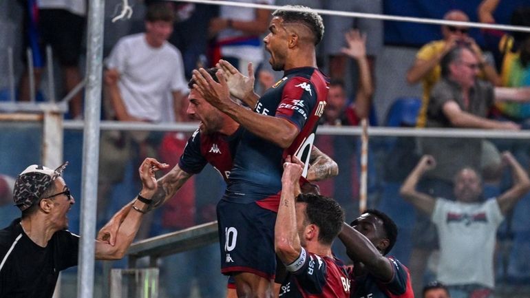 Genoa's Junior Messias celebrates after scoring during the Serie A...