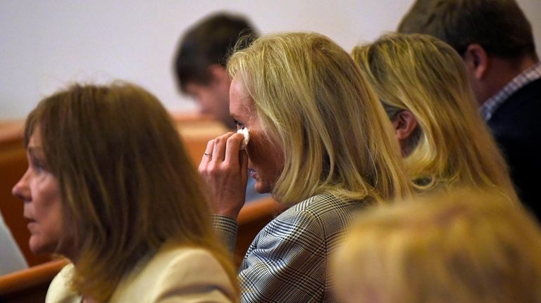 Nancy Eckersley, the mother of Alexandra Eckersley, wipes away tears...