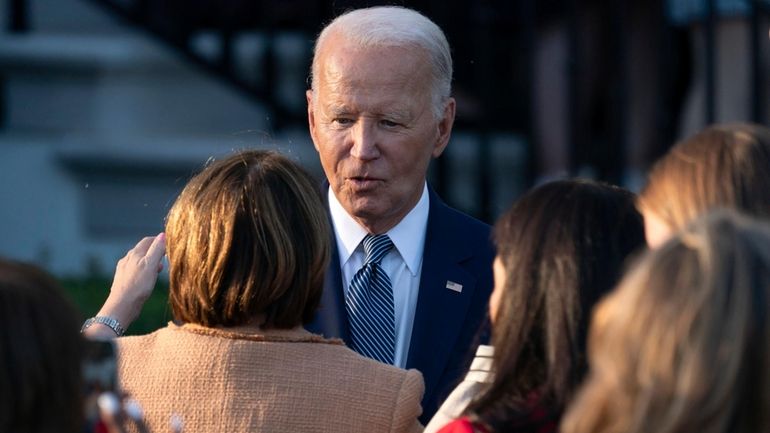 President Joe Biden greets people after speaking at the Violence...