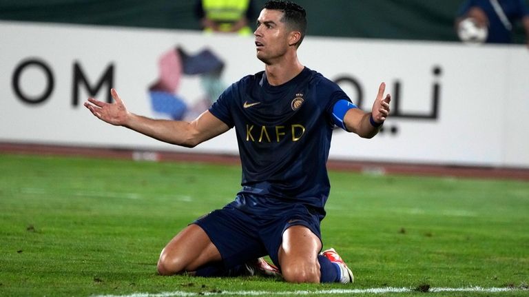 Saudi Arabia's Al Nassr Cristiano Ronaldo reacts in a match...