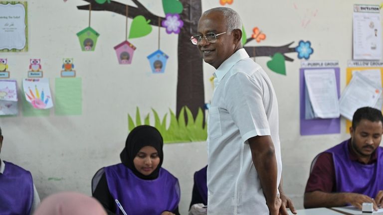 Maldives' incumbent President Ibrahim Mohamed Solih waits to cast his...