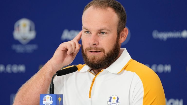 Europe's Tyrrell Hatton meets the journalists during a press conference...