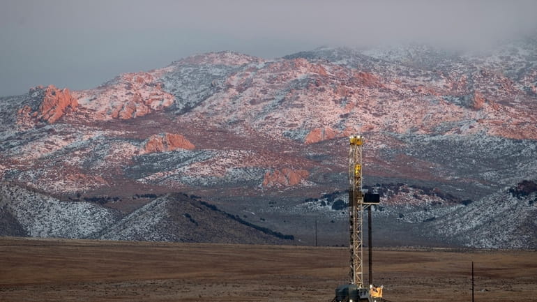 A drill rig stands at a Fervo Energy geothermal site...