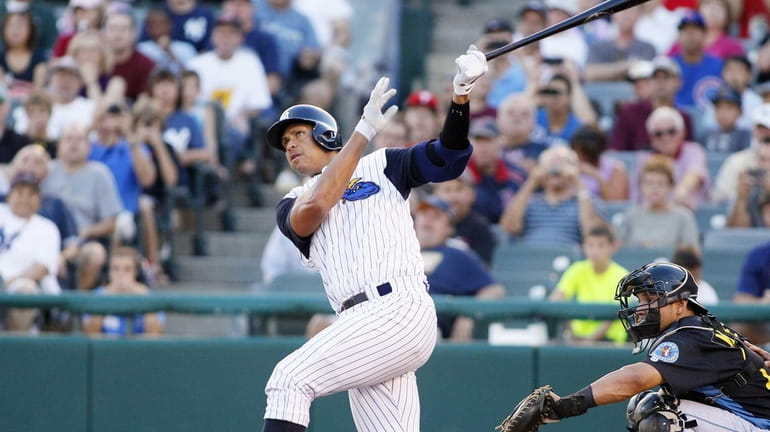 Yankees' Alex Rodriguez hits a solo home run in the...