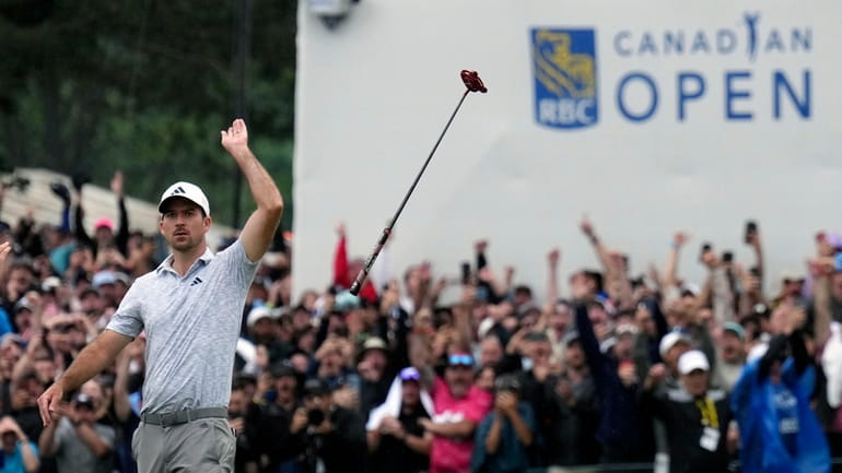 Nick Taylor, of Canada, reacts after winning the Canadian Open...
