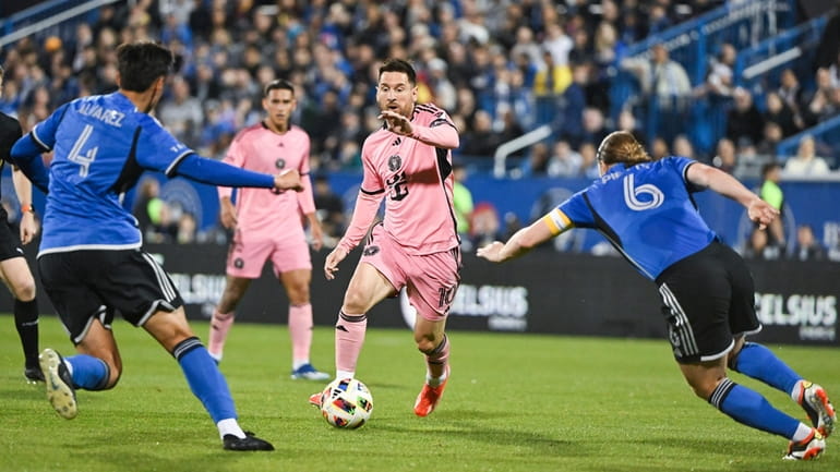 Inter Miami's Lionel Messi (10) pushes forward as CF Montreal's...