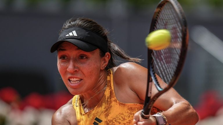 Jessica Pegula of the U.S. returns the ball against Marie...