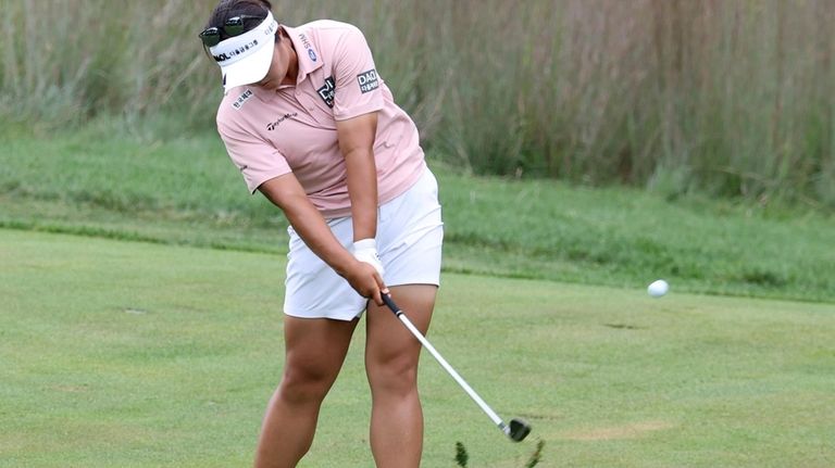 Haeran Ryu, of South Korea, hits from the 15th fairway...