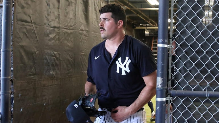 Yankees' Carlos Rodon's Next Step on Hold due to Back Issue