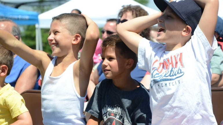 From left to right: Massapequa residents Michael Nero, 8, Dean...