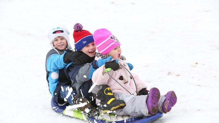 From right, Julianna Clark, Nicholas Tizzano and Jayden Clark enjoy their...