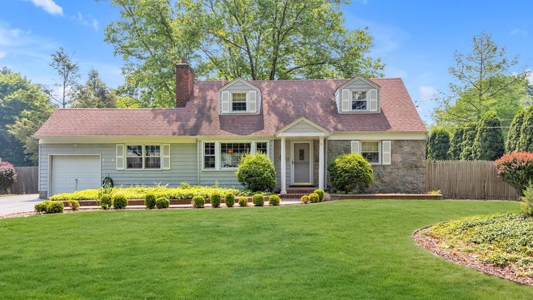 This $649,000 East Northport home has four bedrooms.