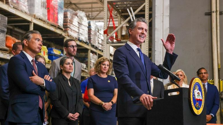 California Gov. Gavin Newsom speaks as Attorney General Bob Bonta,...