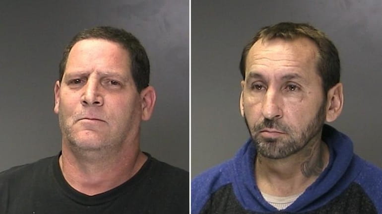 Michael Heafy, 50, of Patchogue, left, and Christopher Schmidt, 44,...