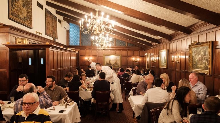 The bustling dining room at Peter Luger in Great Neck.