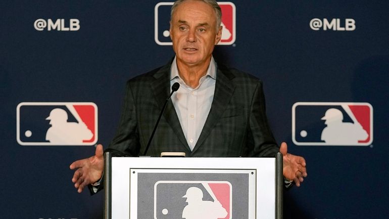 Major League Baseball commissioner Rob Manfred speaks during a news...