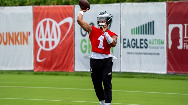 Philadelphia Eagles quarterback Jalen Hurts (1) runs a drill during...