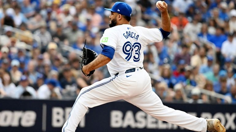 Toronto Blue Jays relief pitcher Yimi Garcia (93) throws to...