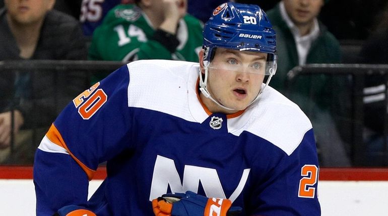 Kieffer Bellows of the Islanders skates during the first period against...