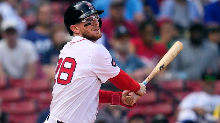 Boston Red Sox catcher Danny Jansen watches his line out...