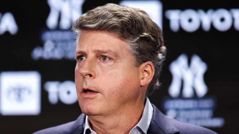 Yankees principal owner Hal Steinbrenner speaks during a news conference...