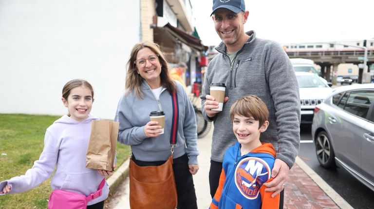 Melanie and Jim Taylor of Rockville Centre with their children, Hudson, 7,...