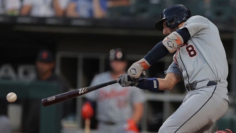 Detroit Tigers' Matt Vierling hits a RBI double during the...