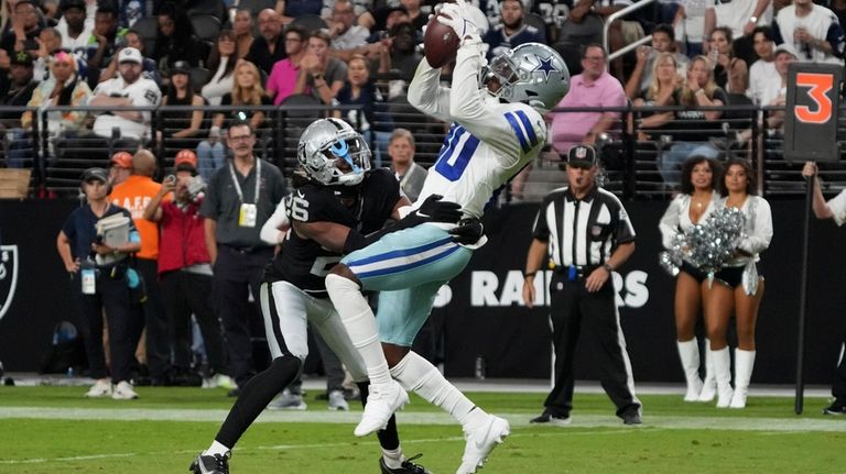 Dallas Cowboys wide receiver Racey McMath (80) makes a catch...