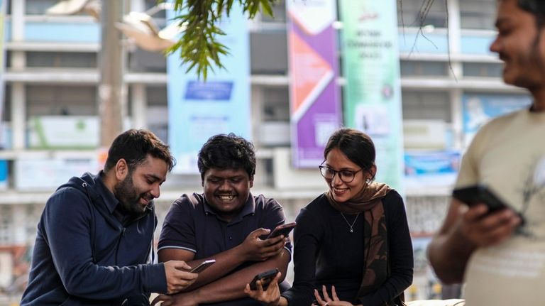 A group of youth interact at the Dhaka University area,...