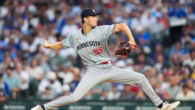 Minnesota Twins starting pitcher David Festa throws against the Chicago...