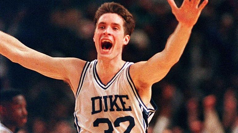 Duke University's Christian Laettner runs down the court after making...