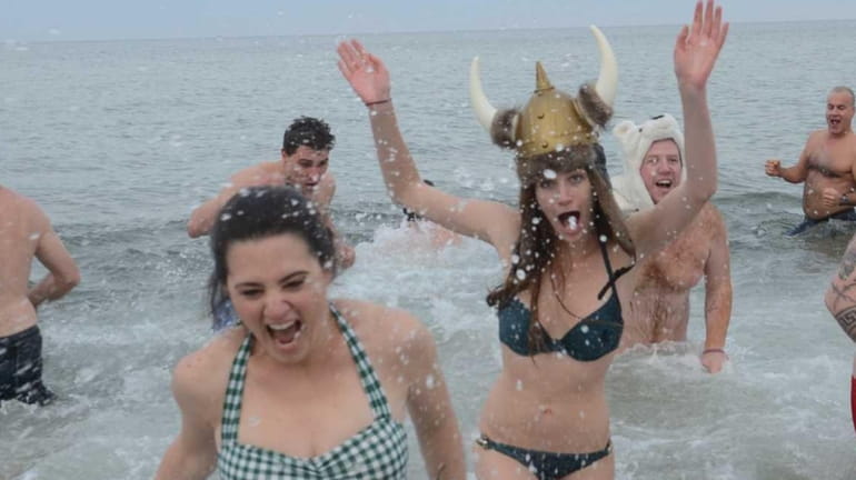 Participants of the 2014 New Year's Day Polar Plunge at...