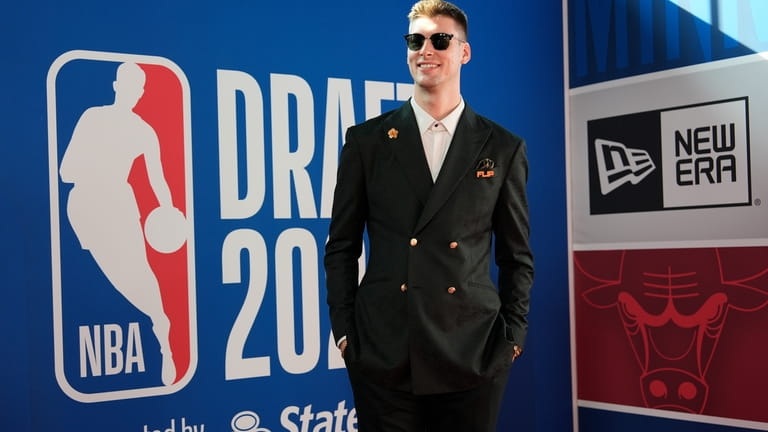 Kyle Filipowski walks the red carpet before the NBA basketball...