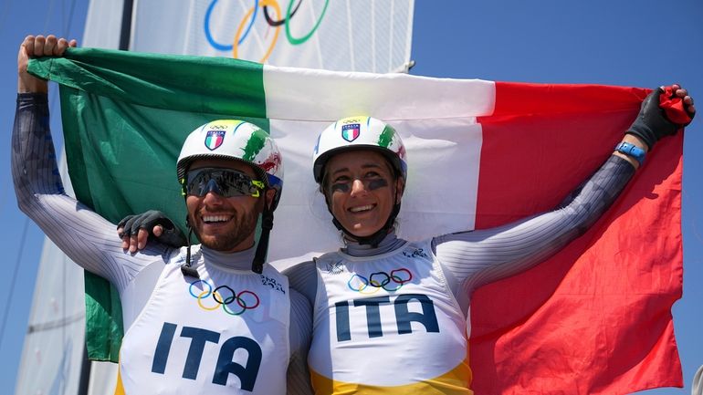 Ruggero Tita and Caterina Banti of Italy celebrate after the...