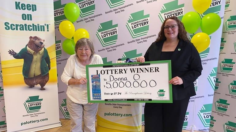 This image provided by the Pennsylvania Lottery shows Donna Osborne,...