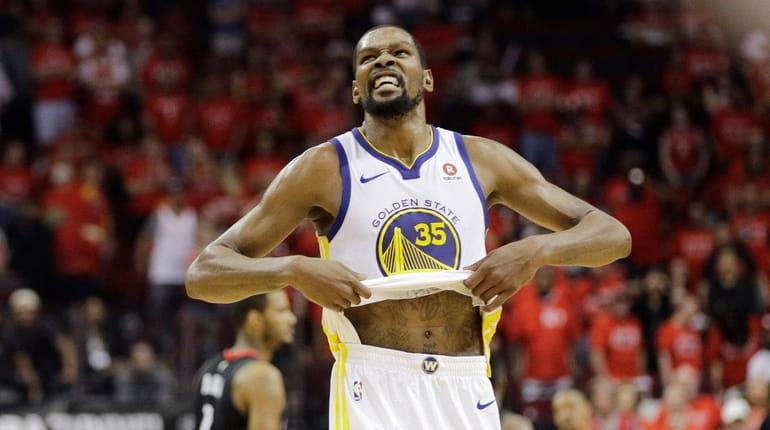 Golden State Warriors forward Kevin Durant (35) reacts as the...